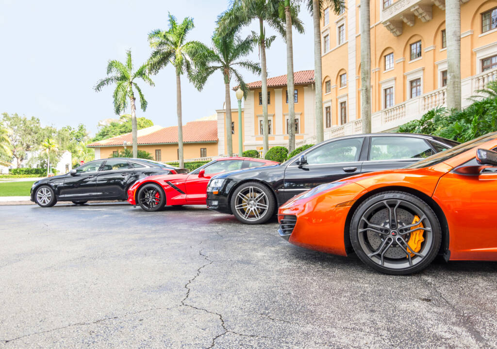 MIAMI, FL - DECEMBER 2, 2013: the famous Biltmore Hotel and sport cars.It was the set of various films like Bad Boys 2,Miami Vice and CSI:Miami