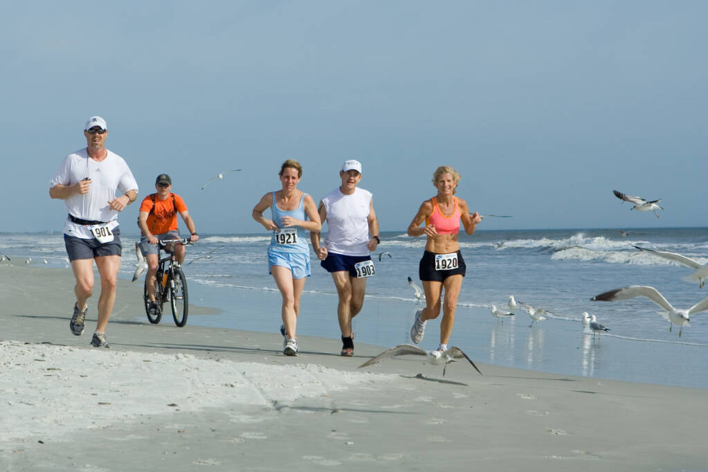 ATLANTIC BEACH, FLORIDA - FEBRUARY 28: Runners compete in the Jetty to Jetty Ultra marathon and Team Relay on February 28, 2009 in Atlantic Beach, Florida.